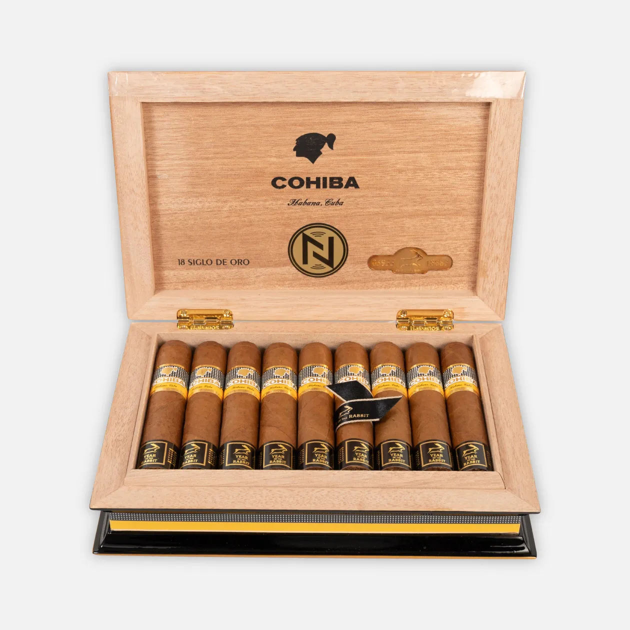 Cohiba Siglo de Oro cigars in elegant wooden box packaging.