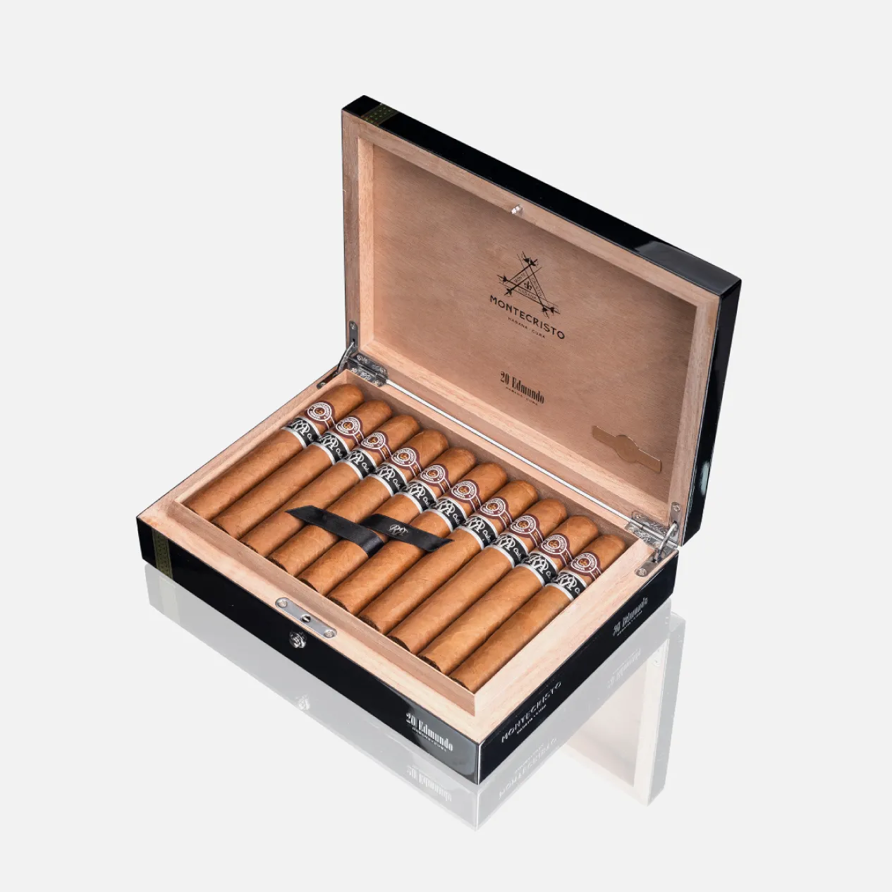 Montecristo Edmundo cigars in an elegant black and wood box.