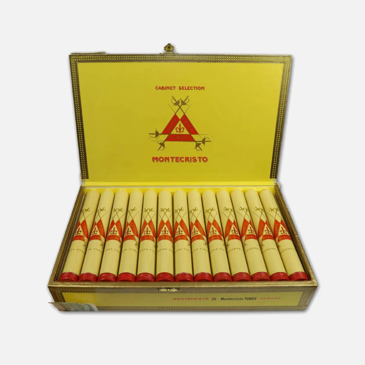 Montecristo premium cigars in elegant yellow box.